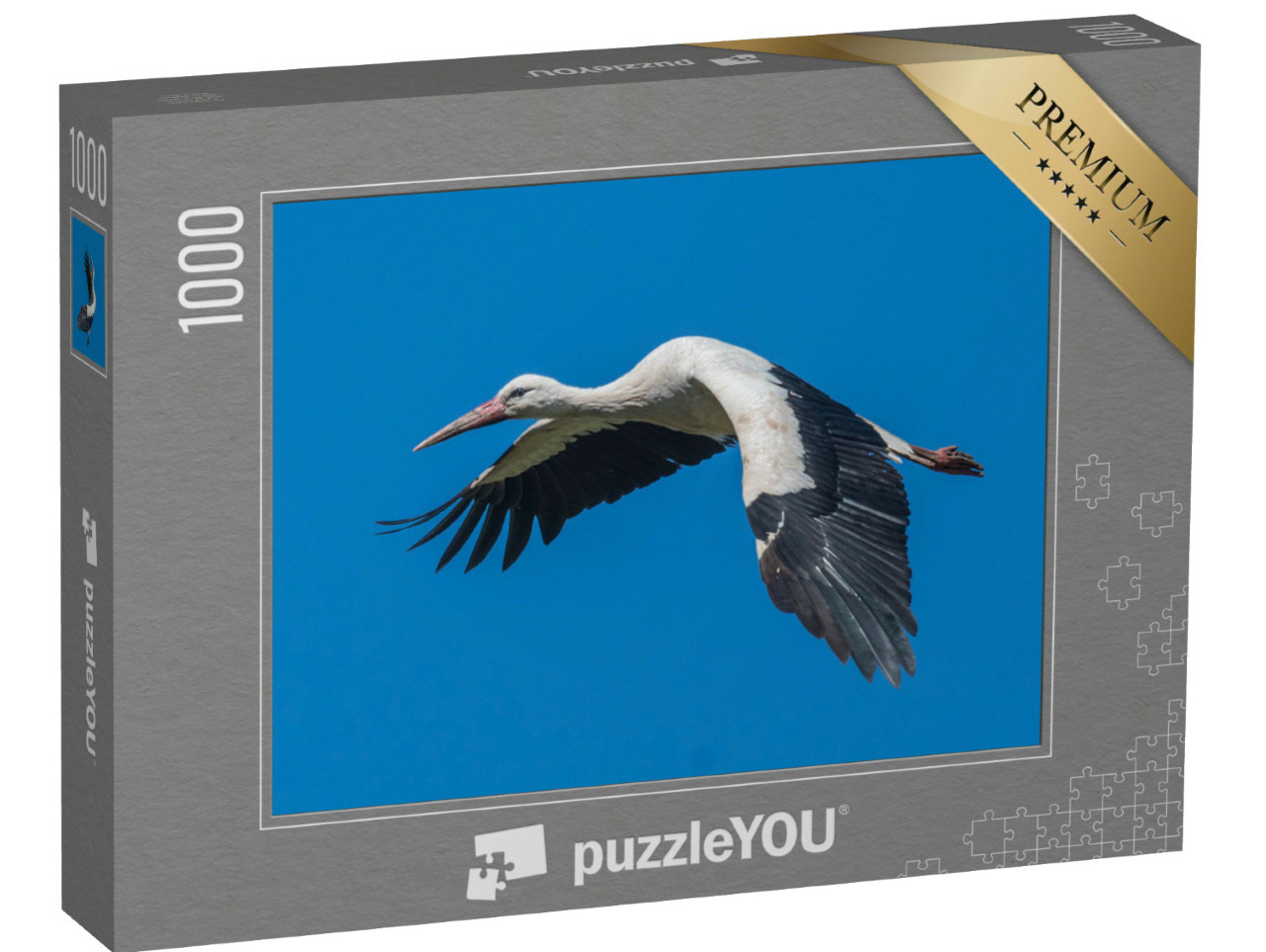 Puzzle de 1000 pièces « Cigogne blanche en vol dans le ciel bleu »