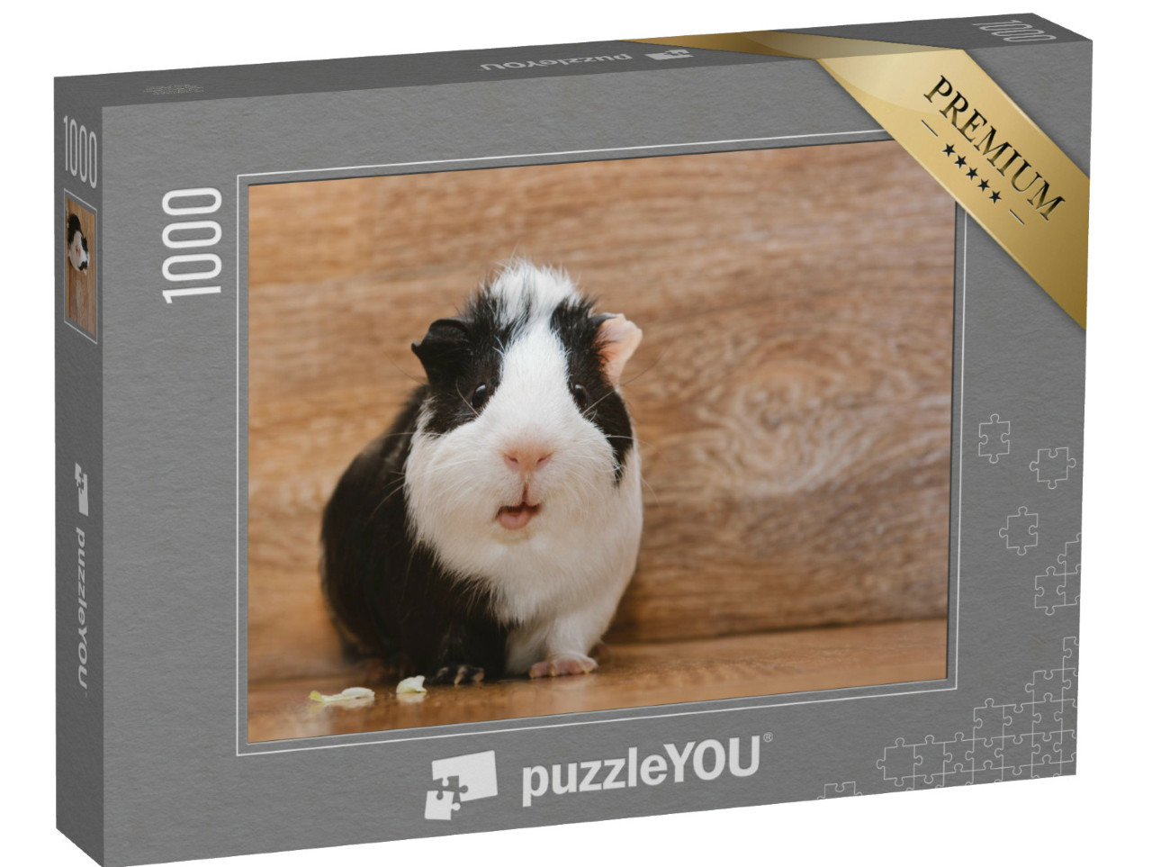 Puzzle de 1000 pièces « Un adorable cochon d'Inde noir et blanc mangeant des feuilles de chou »