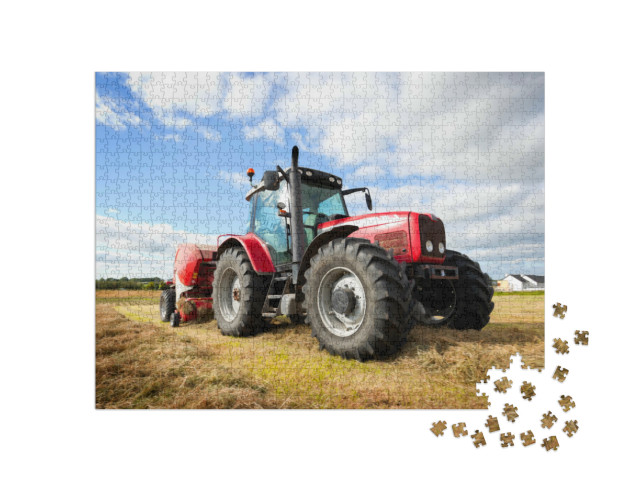Puzzle de 1000 pièces « Un grand tracteur ramasse des meules de foin dans un champ »