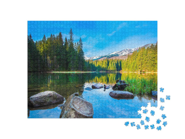 Puzzle de 1000 pièces « Pierres dans l'eau calme d'un lac de montagne »