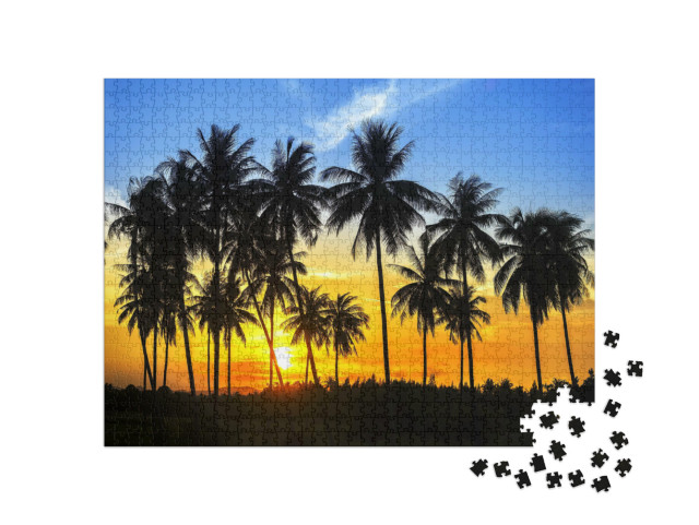 Puzzle de 1000 pièces « Silhouettes de cocotiers dans un coucher de soleil coloré »