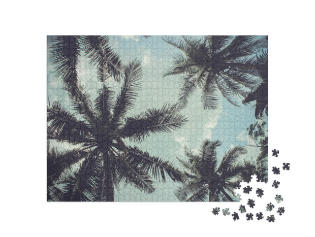 Puzzle de 1000 pièces « Branches de cocotiers contre ciel bleu »