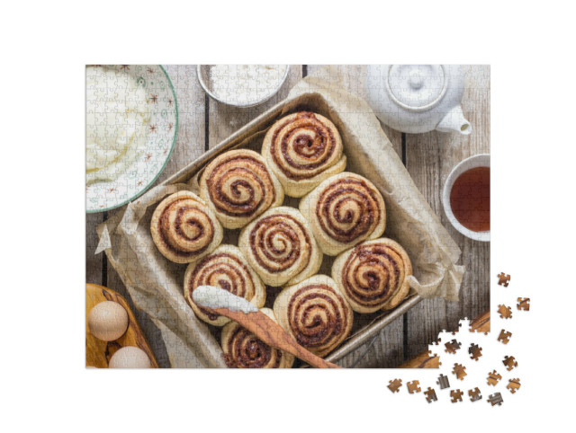 Puzzle de 1000 pièces « Escargots à la cannelle avec des épices et du cacao entièrement sur du papier parchemin »