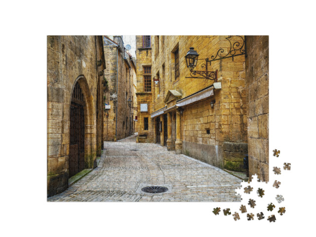 Puzzle de 1000 pièces « Ruelle étroite typique de la vieille ville médiévale de Sarlat la Caneda, Périgord, France »