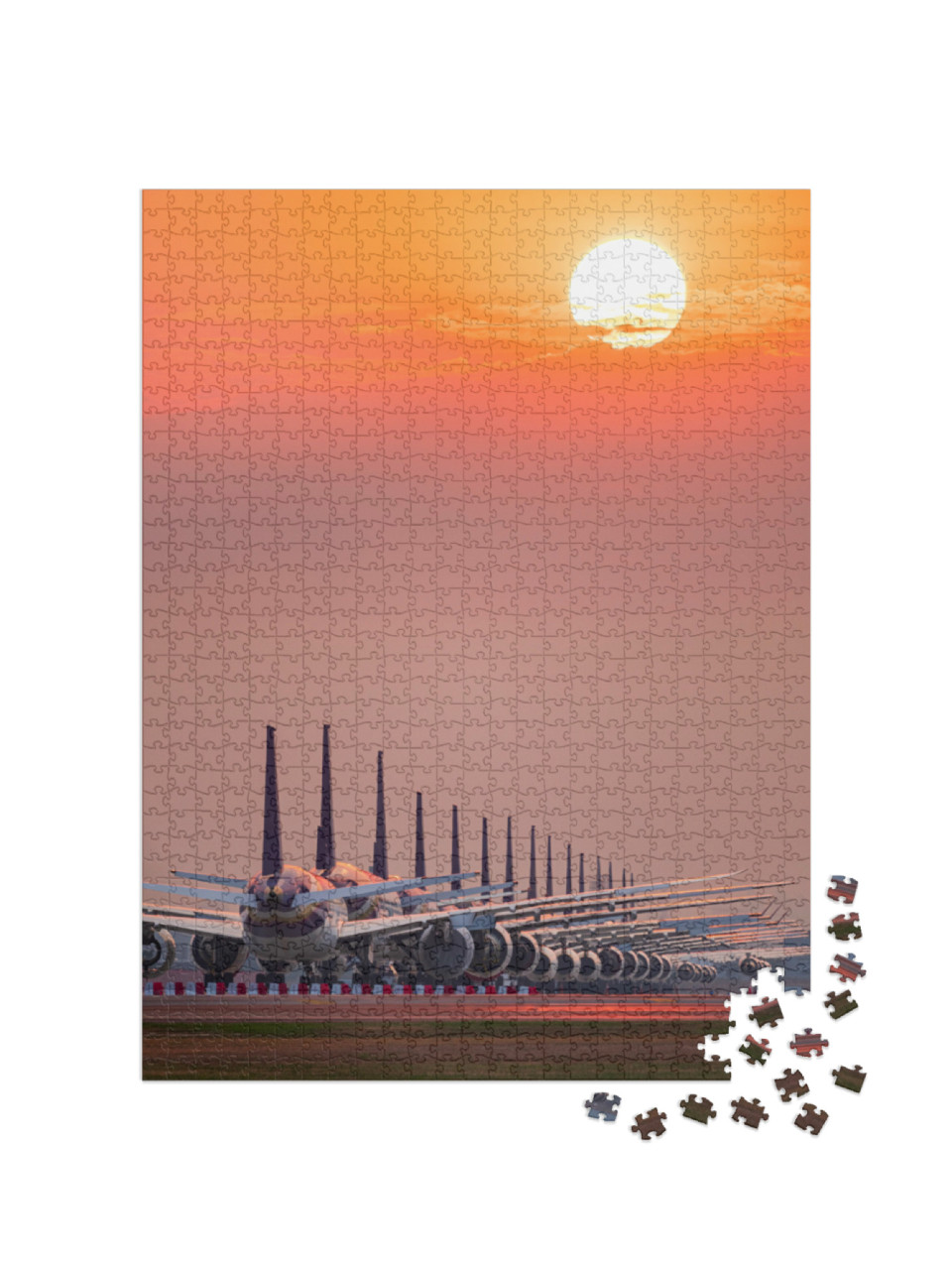 Puzzle de 1000 pièces « Des avions parfaitement garés au coucher du soleil »